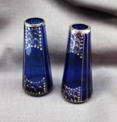 A pair of Art Nouveau style blue glass and silver overlaid vases of tapering cylindrical form,