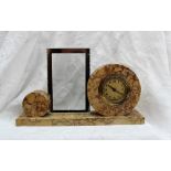 An Art deco style marble mantle clock / photograph frame, with variegated marble roundel,