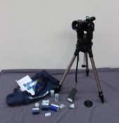 A Meade ETX-90 digital telescope, with additional lenses,