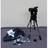 A Meade ETX-90 digital telescope, with additional lenses,