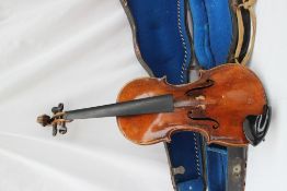 A German violin, with a two piece back, ebonised stringing, bears a label "Nicolaus Amati,