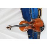 A German violin, with a two piece back, ebonised stringing, bears a label "Nicolaus Amati,