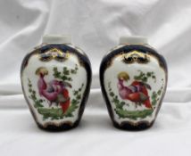 A pair of Samson porcelain vases in the Worcester style with a blue scale ground and decorated with