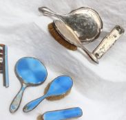 A George V silver and enamel part dressing table set, London,