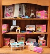A collection of Sindy accessories including Sindy's own wardrobe, Armchairs, settee,