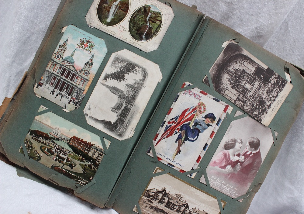 An Art Nouveau style postcard album, containing circa 400 postcards including scenes of Glasgow,