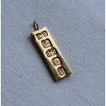 A 9ct yellow gold ingot pendant, approximately 7.