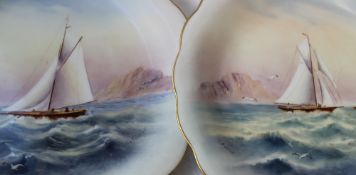 A pair of Royal Worcester porcelain plates of circular waved form,