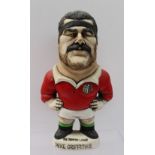 A John Hughes pottery Grogg of Mike Griffiths, in a British Lions Jersey with the No.