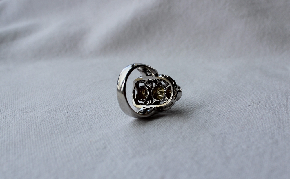 A diamond dress ring, set with three fancy yellow round brilliant cut diamonds, - Image 5 of 6