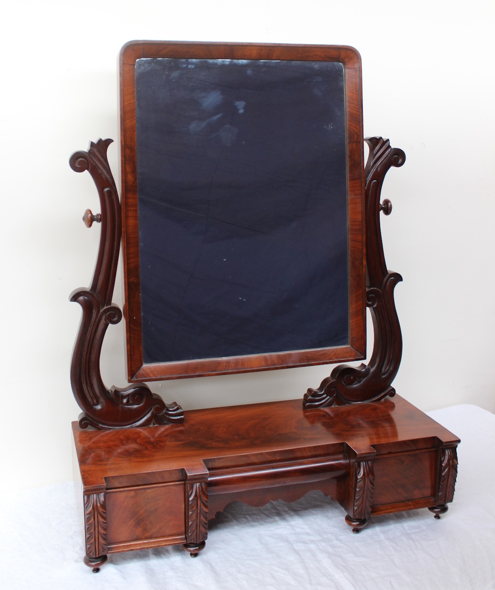An early Victorian mahogany dressing table mirror,