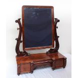 An early Victorian mahogany dressing table mirror,