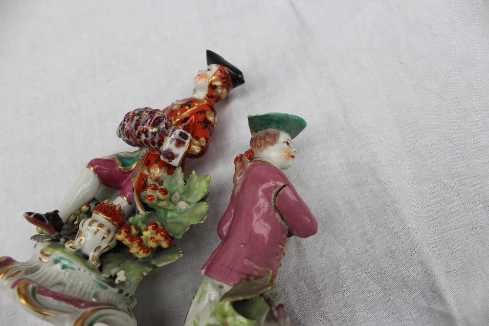 A pair of 18th century porcelain figures, possibly Bow, the one squeezing grapes into a chalice, - Image 4 of 6