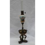 A miniature champleve enamel decorated oil lamp,