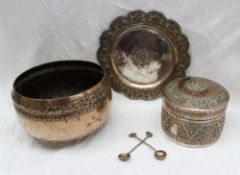 An Indian white metal bowl, with a band of scrolling leaves to the top,