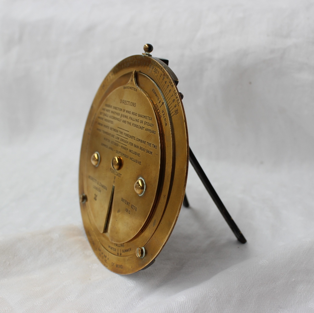 A Negretti and Zambra desk top brass barometer dial with a fixed outer rim for Barometer readings, - Image 3 of 5