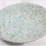 Studio pottery by Barbara Ineson - A large pottery bowl with green swirling decoration,