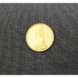 A Victorian gold Sovereign dated 1889,