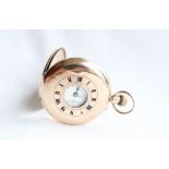 A 9ct yellow gold half hunter keyless wound pocket watch,