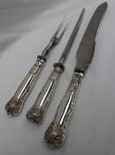 A late Victorian silver handled carving set, comprising knife, forks and sharpening steel,