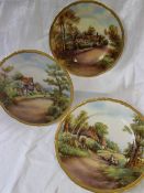 Three Royal Worcester porcelain plates of circular ogee form,