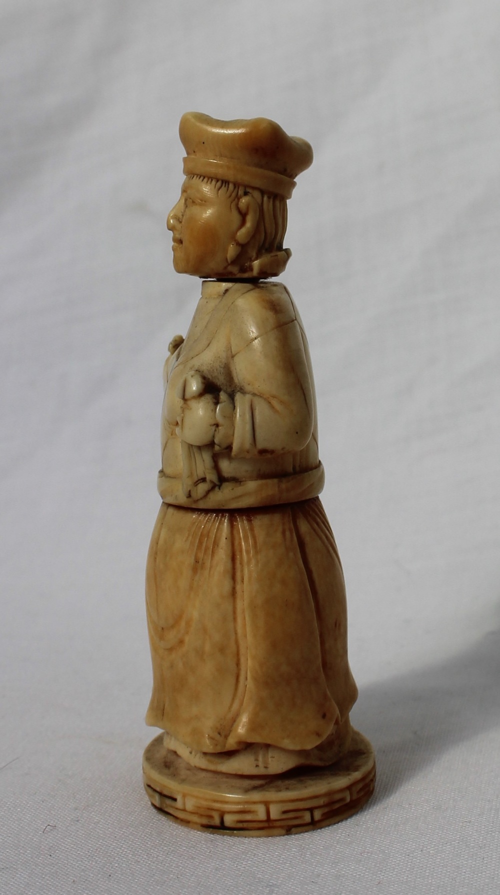 A late 19th century ivory figural container, in the form of a female figure holding a cloth and orb, - Image 4 of 8