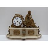 A 19th century gilt metal and alabaster mantle clock, with a seated female figure holding a mask,