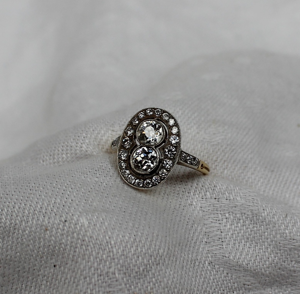 A diamond dress ring, set with two round old cut diamonds each approximately 0. - Image 3 of 6
