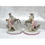 A pair of 19th century Continental porcelain models of Marley's Horses with attendants, 23.