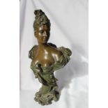 After J Fairo An Art Nouveau style bust of a maiden Painted spelter Signed to the reverse 35cm high