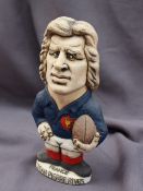 A John Hughes pottery Grogg, of Jean Pierre Rives, in a French jersey with the No.