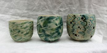 Studio pottery by Barbara Ineson - A set of three pottery vases with a green line and dot