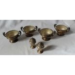 A set of four Edward VII silver twin handled pedestal open table salts, London, 1903,