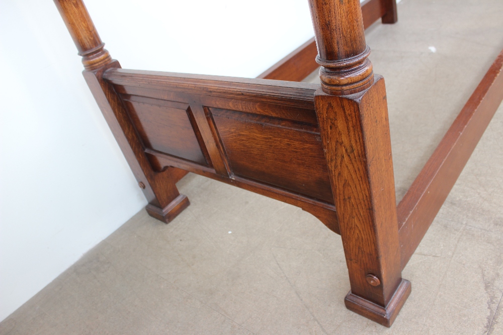 A 20th century oak four poster single bed, the canopy with a moulded cornice, - Image 5 of 7