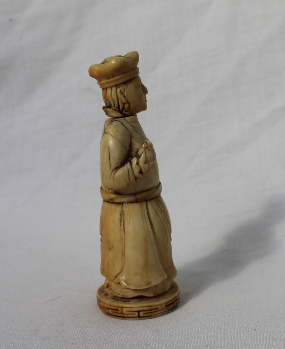 A late 19th century ivory figural container, in the form of a female figure holding a cloth and orb, - Image 2 of 8