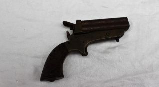 A four barrel rimfire pistol with sliding action, stamped 'Tipping & Lawden, Sharps-Patent',