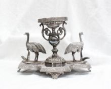 A electroplated Britannia metal table centrepiece in the form of a central urn flanked by Emu's,