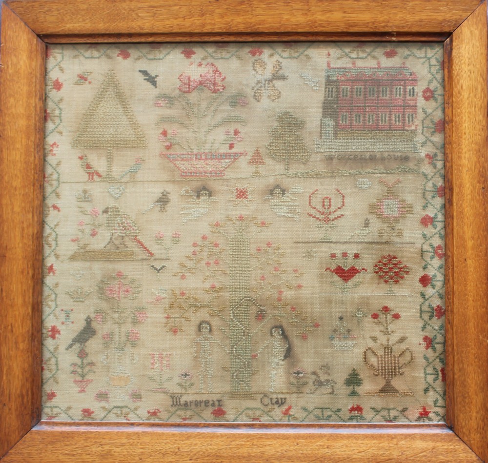 A 19th century sampler decorated with an image of Worcester House, with images of birds,
