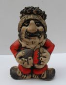 A John Hughes pottery Grogg, in a welsh jersey, with No.