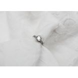 A solitaire diamond ring,