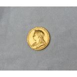 A Victorian 1837-1897 double headed gold commemorative coin