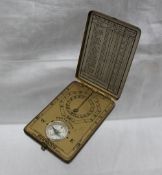 An Ansonia Clock Co Sunwatch pocket sundial and compass, in a brass case, 7.