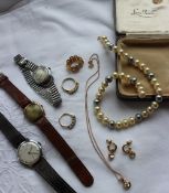 A 9ct gold wristwatch, together with two other watches, faux pearls, paste set heart shaped ring,