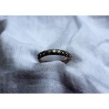 A ten stone diamond half eternity ring,