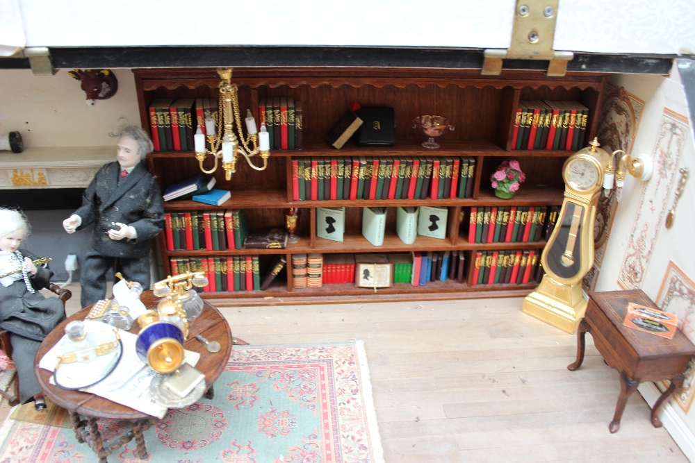 Dolls House - A long house, the hinged slate roof opening to reveal a library with bookcases, - Image 3 of 5