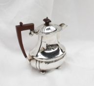 A George V silver hot water jug,