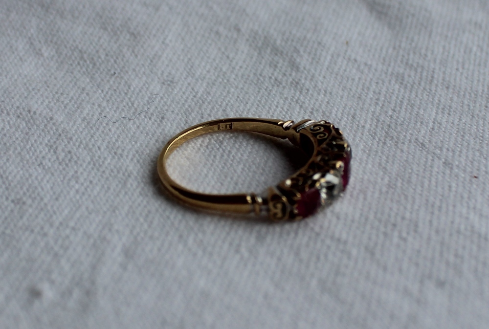 A ruby and diamond line ring, set with three rubies and two round old cut diamonds, - Bild 4 aus 9