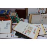 Nine postage stamp albums including world stamps, Tuscany 80 Cents, Western Australia Two Pence,