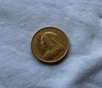 A Victorian £5 gold coin, dated 1893,