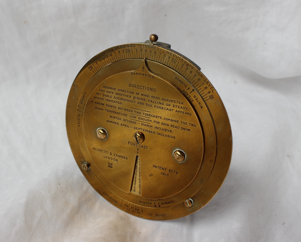 A Negretti and Zambra desk top brass barometer dial with a fixed outer rim for Barometer readings, - Image 2 of 5